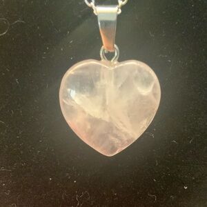 ♥️BRAND NEW♥️semi precious light rose quartz heart on a sterling silver chain.